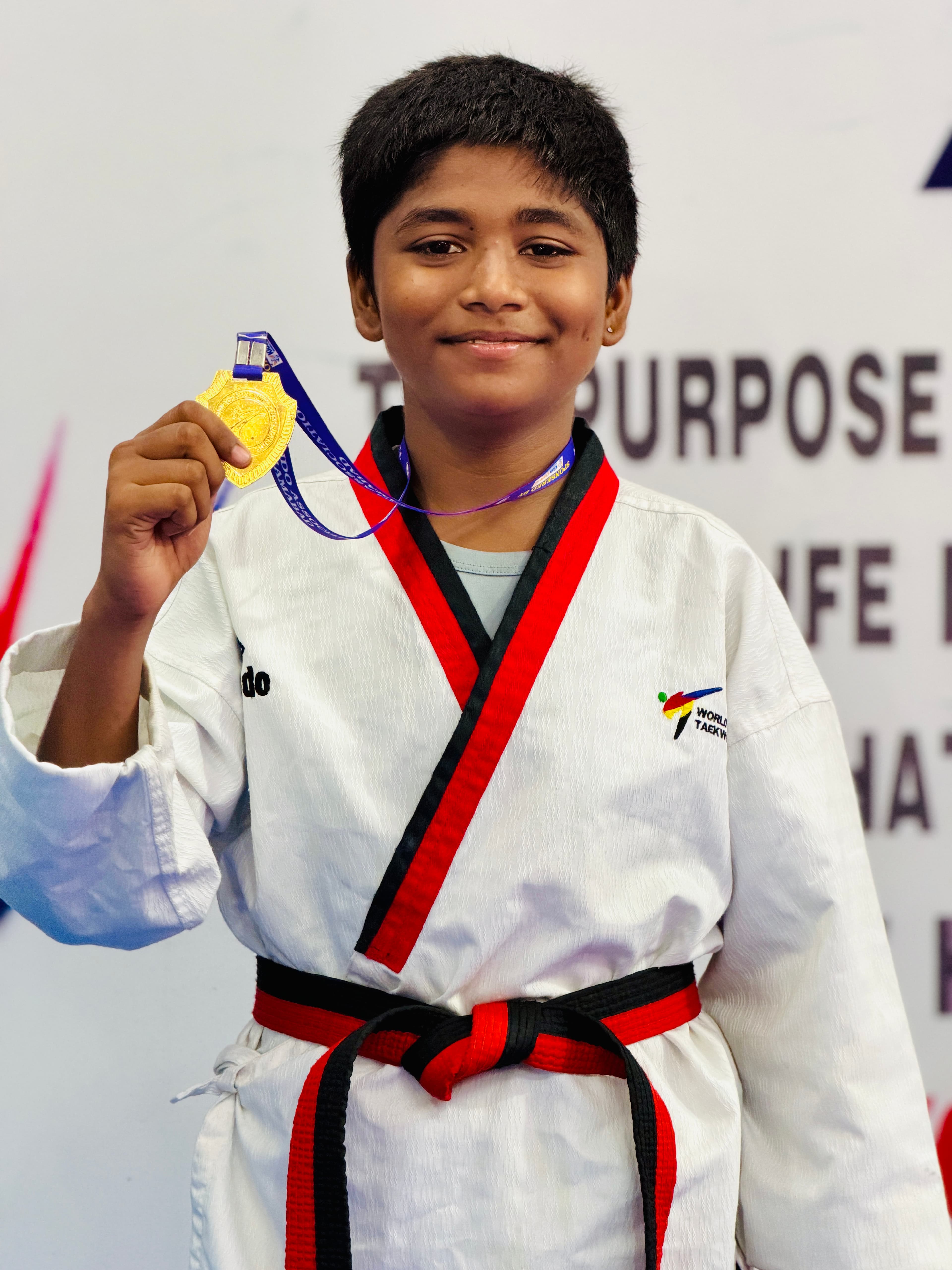 Young athlete with a gold medal
